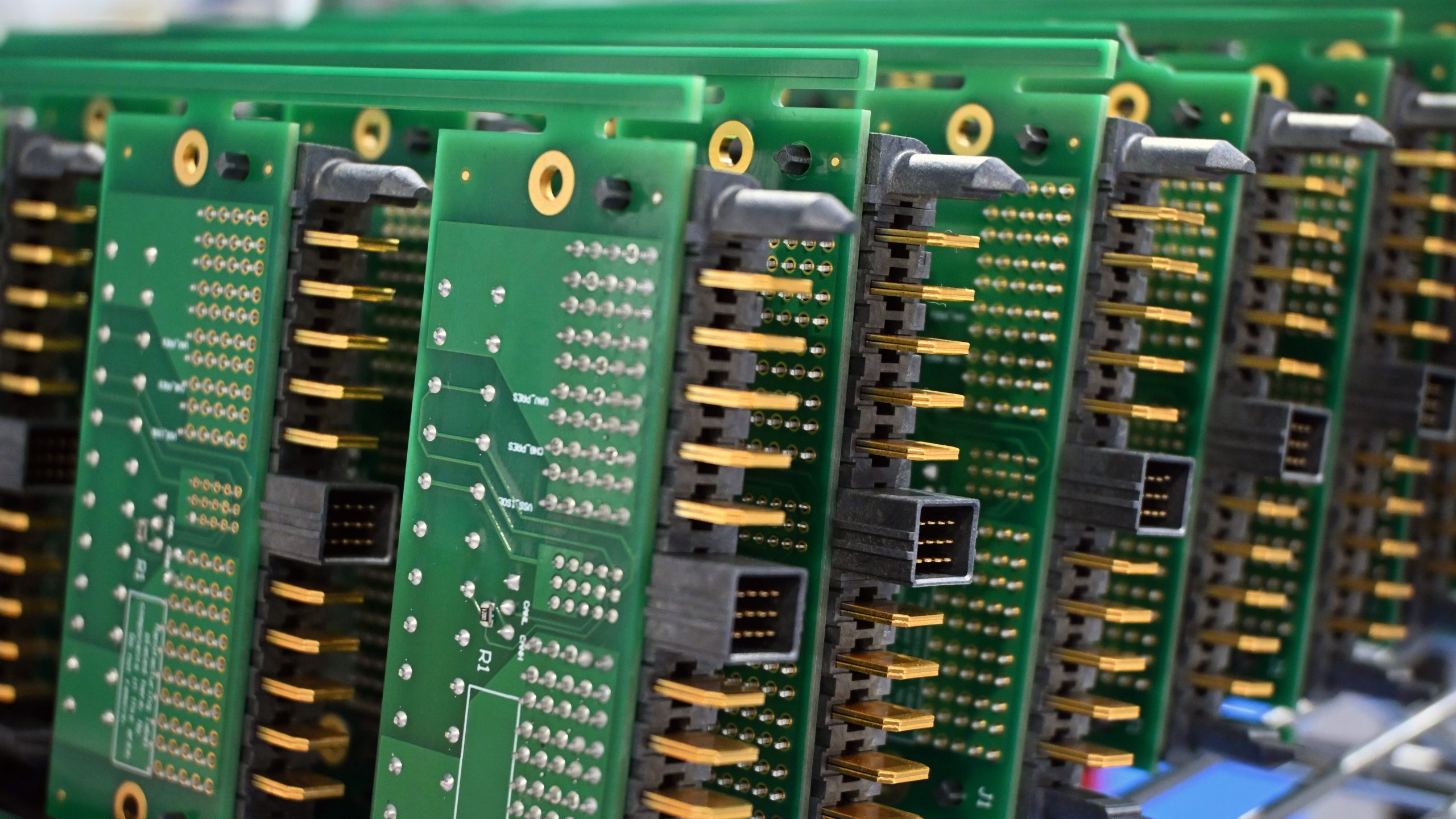 A rack of fully assembled printed circuit boards.