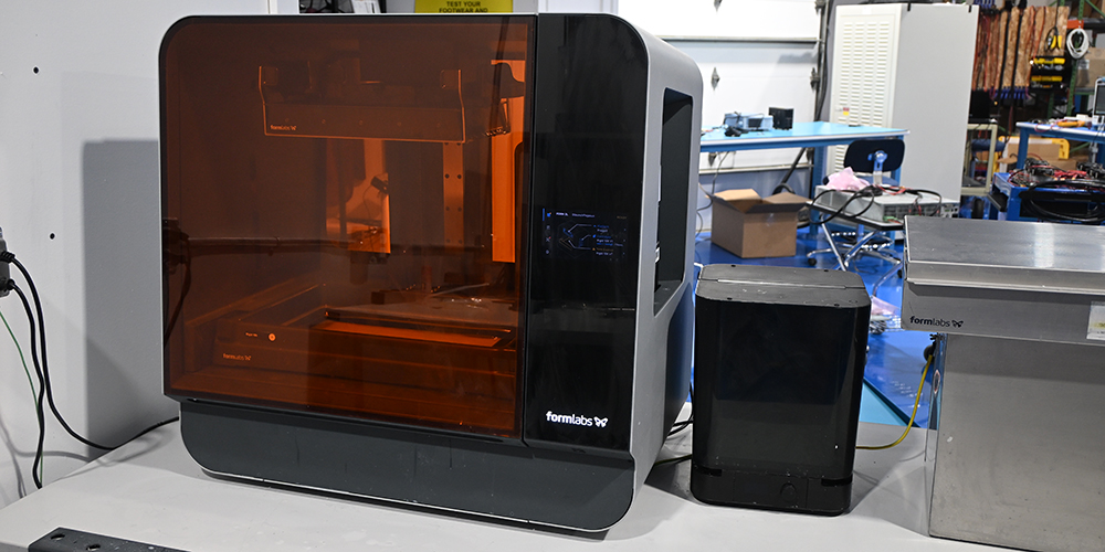A 3D printer on a tabletop.